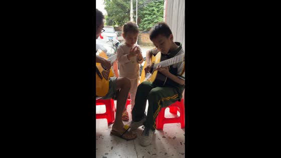 Harmonious strings: father and son unite in musical mastery
