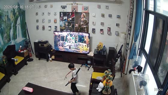 Boy accidentally hits television while swinging toy katana in Guangdong, China