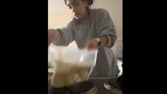 Plastic container melts on hot burner, causing food to spill