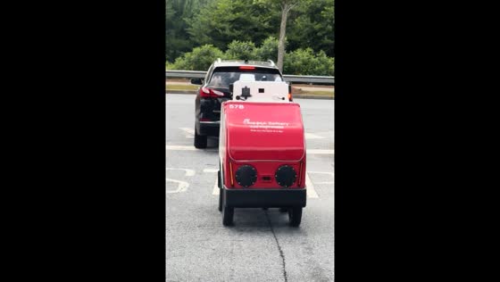 Chick-fil-A's delivery robot stops traffic, delights onlookers