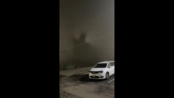 Giant shadow illusion in thick fog in Uniontown, Pennsylvania, USA