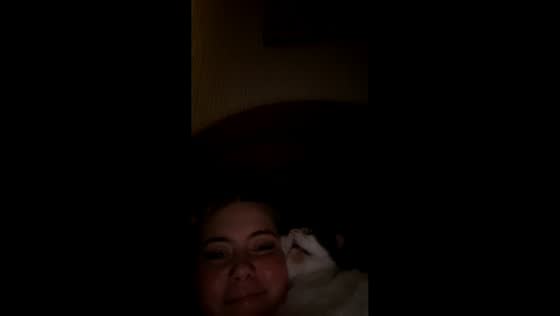 Cat makes bubbly snoring sounds while sleeping next to owner in Leeds, UK