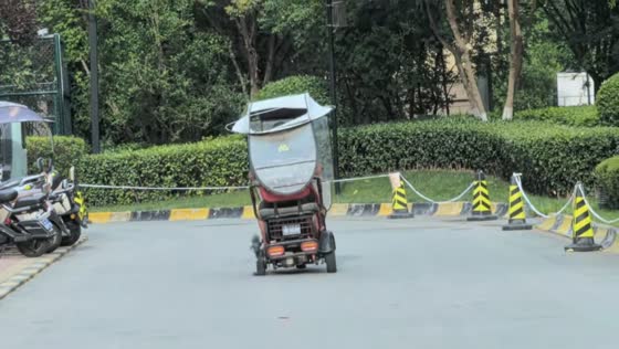 Man casually rides electric bicycle with flat tire in Shaanxi, China