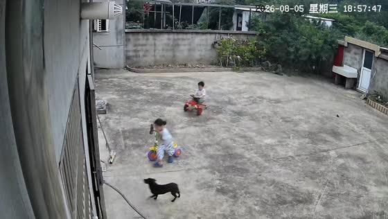 Children rush inside after thunder and lightning outside house in Anhui, China