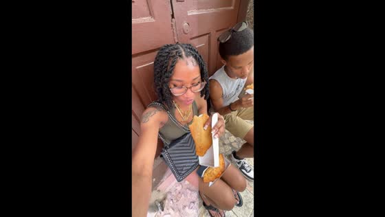 Sudden spark startles diners eating by sidewalk Las Terrenas, Dominican Republic
