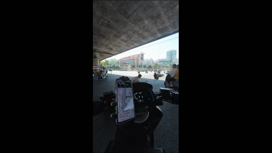 Two motorcycles collide at underpass, throwing rider and passengers onto road in Guangxi, China