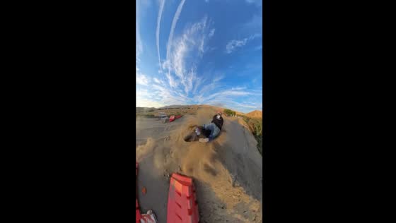 Biker hits soil on road barrier in Bakersfield, California