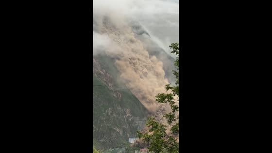 Huge landslide engulfs mountainside and blocks river in Maoxian, China