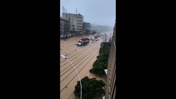 Typhoon Saudel flooding submerges roads and strands vehicles in Putian, Fujian, China