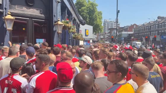Arsenal fans flood pubs and streets after Premier League title win in London, UK