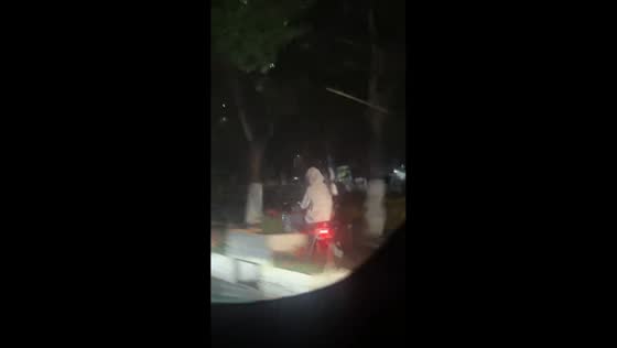 Motorcyclist crashes while avoiding water on flooded road in Yunnan, China