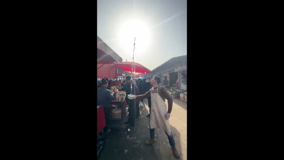 Yogurt splash mishap during street performance in Xinjiang, China