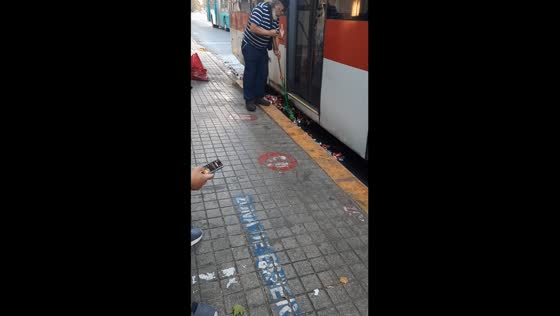 Clever can crusher in Santiago, Chile uses buses to flatten trash