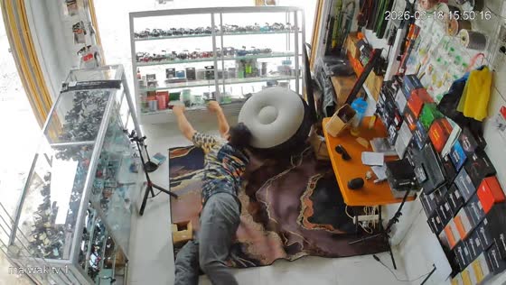 Man accidentally breaks glass display while trying to lie down in Tanah Laut, Indonesia