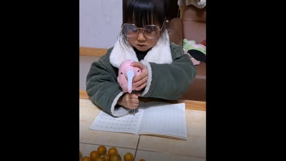 Child uses pencil sharpener as hammer for homework in Hunan province, China