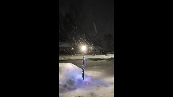 Heavy snowfall reduces visibility in Albany, New York, USA