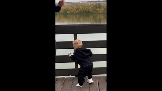 Boy throws shoe into river during workout in Liski, Russia