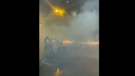Protesters in Tbilisi fire fireworks using machine gun-like device 