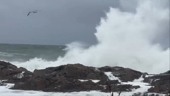 Fierce winds and crashing waves lash coastline in Ogunquit, Maine, USA