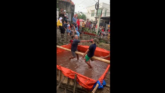 Pillow-whacking splashdown: hilarious pool game takes a wacky turn in Depok City
