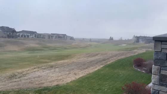 Blustery winds batter Missoula golf course in Montana, USA