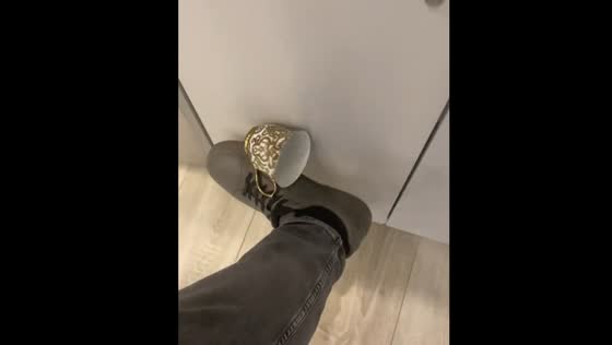Person catches falling cup with leg in Moscow