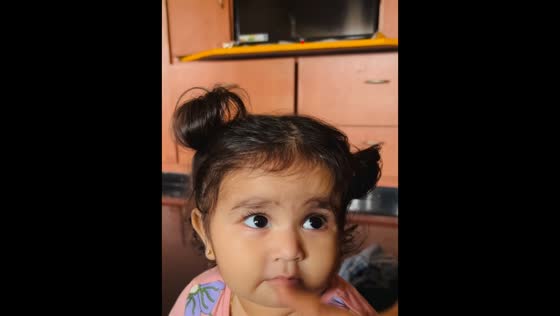 Baby making adorable sounds in Hyderabad, India