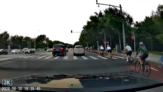 Cyclist collides with turning car on bicycle lane in Beijing, China