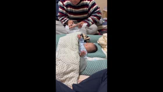 Baby reacts to nail clipper sound but stays asleep in Higashiosaka, Japan