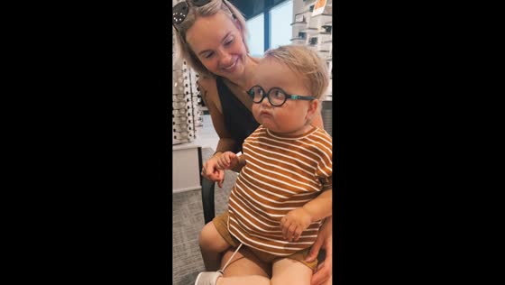 Little boy amazed by new glasses in St. Thomas, Canada