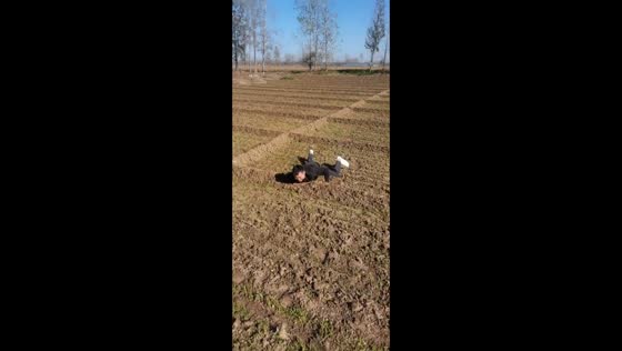 Failed backflip attempt in a farming field in Henan, China