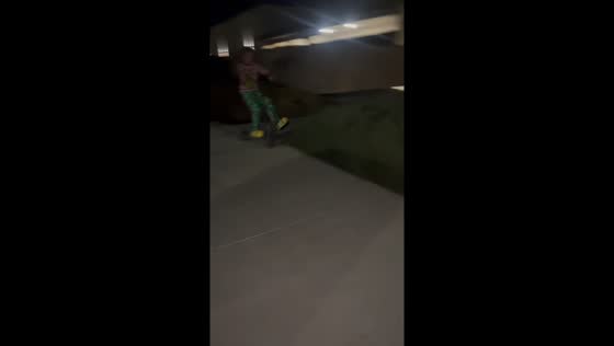 Boy crashes scooter into bushes in Madera, California, USA