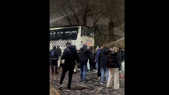 Bus slides on ice in Nottingham, students step in to stop it