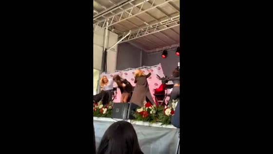 Backdrop falls almost hits Nina Dobrev at TVD convention in Covington, Georgia