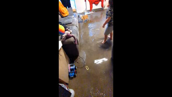 Flooded house in Brough, UK: a glimpse of the waterlogged home and heroic firefighters