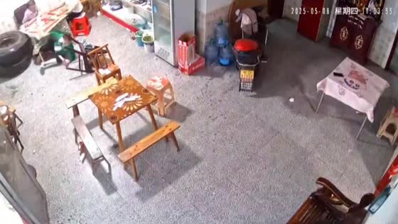 Tire crashes into house, startling people and dog in Hunan, China