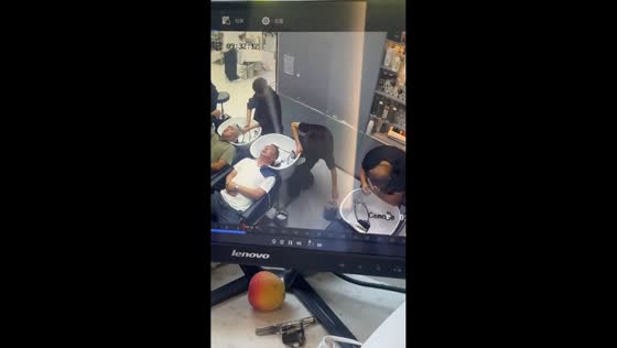 Customer startled by water spray prank at salon in Shaanxi, China