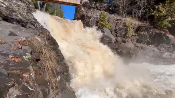 Spring runoff creates powerful cascade at Lester Park in Duluth, Minnesota, USA