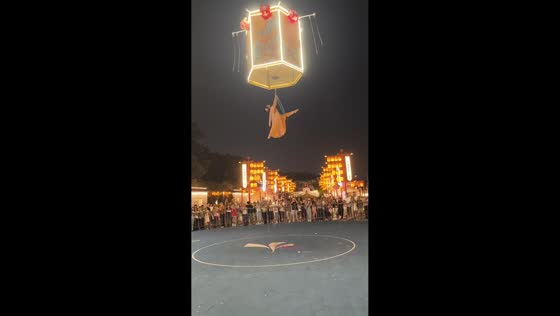 Aerial performer falls during lantern show in Guangzhou, China