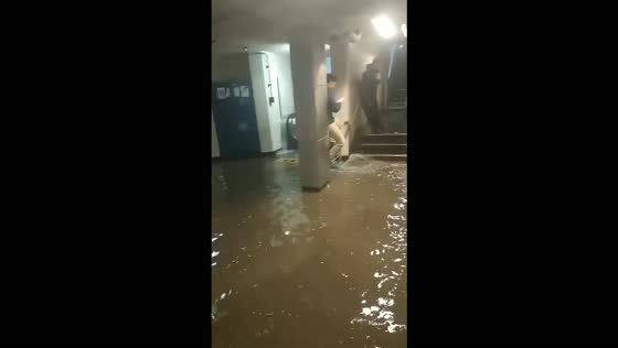 Flash flooding overwhelms Salvador Metro Station during a severe storm in Santiago, Chile