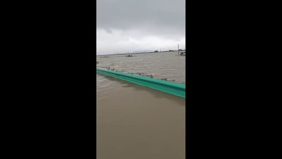 Severe flooding submerges roads and farmland after Typhoon Dolphin in Taizhou, China