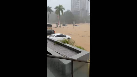 Severe flash flooding submerges streets and vehicles in Wuzhishan, China