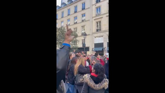 Brazilian voters gather in large crowds outside Espace Vinci during election in Paris, France