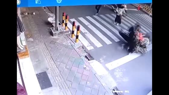 Motorcycle hits student at zebra cross in Bandung, Indonesia