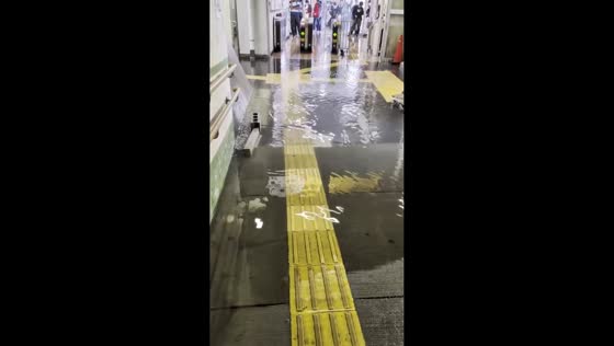 Heavy rain floods train station at Higashi-Siogama Station, Shiogama, Japan