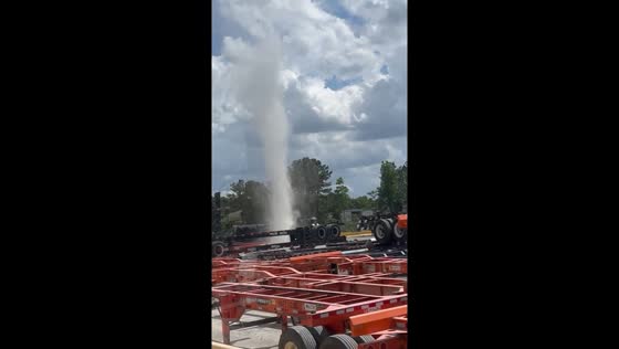 Dust devil whirls through Savannah vehicle yard