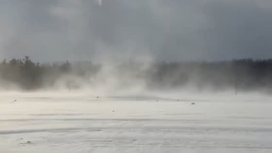 Rare snow rollers form in strong winds at Black Creek in Chili, New York, USA