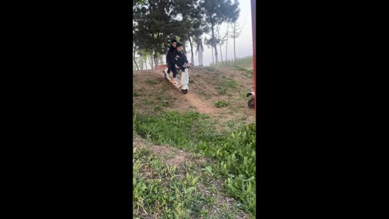 Passenger falls off motorcycle after small slope ride in Shandong, China