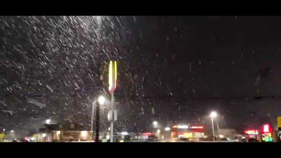 Heavy snowfall intensifies during nighttime drive in Kentucky, USA