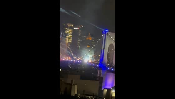 Small fires erupt on Brooklyn Bridge during fireworks show in New York City, USA